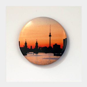 runder Flaschenöffner mit Foto Berlin Skyline im Sonnenuntergang